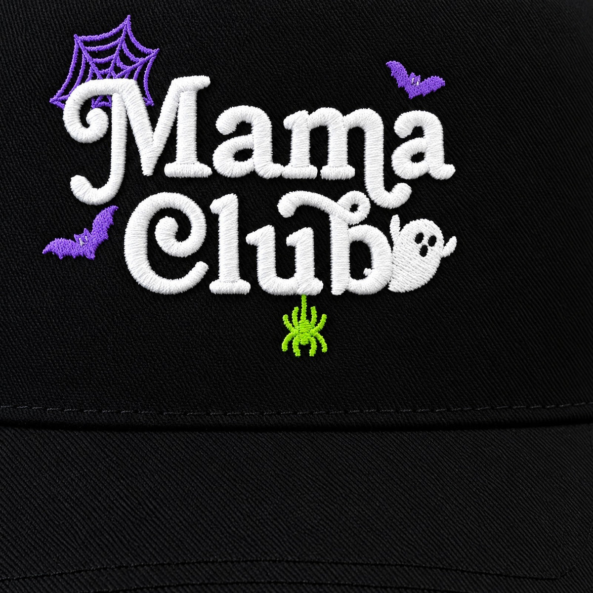 Close-up of the 3D puff Mama Club embroidery with purple spiderweb, bats, green spider and ghost