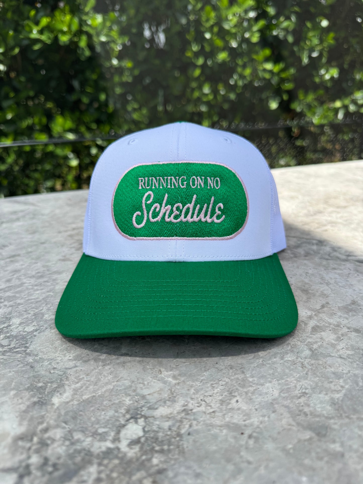 Running on No Schedule Trucker Hat