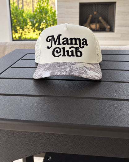 Mama Club white and grey camo trucker on the patio