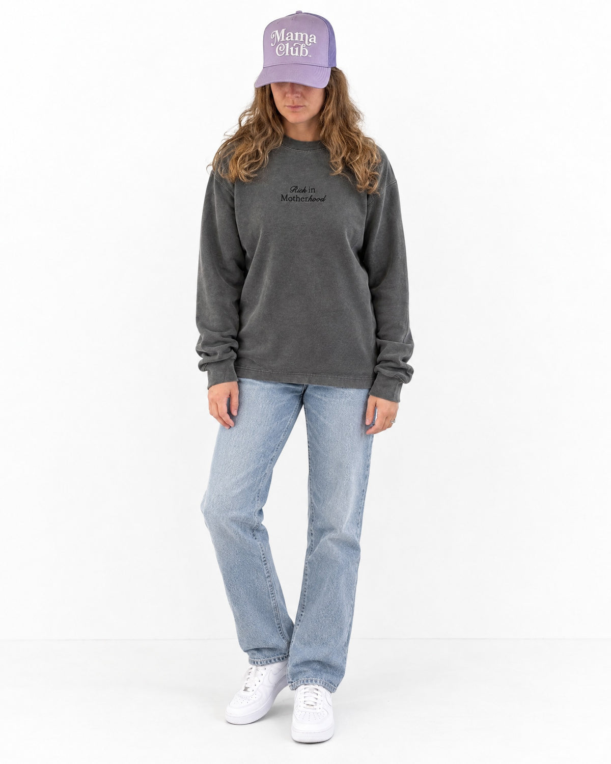 Rich in Motherhood crewneck in pepper grey, full body front view with jeans and sneakers to show length
