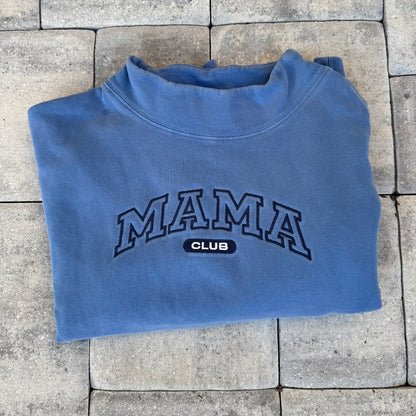 Blue Mama Club embroidered mock neck, photographed flat on stone from the Call Her Mama photoshoot