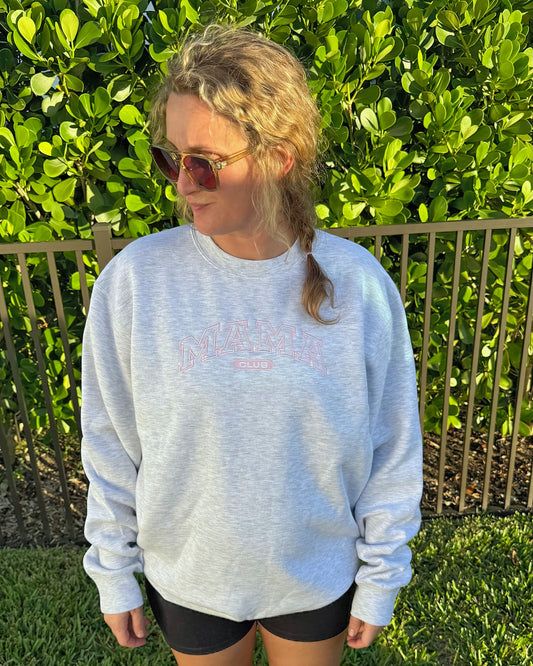 Mama Club embroidered crewneck in heather grey with blush pink MAMA CLUB embroidery, worn outdoors